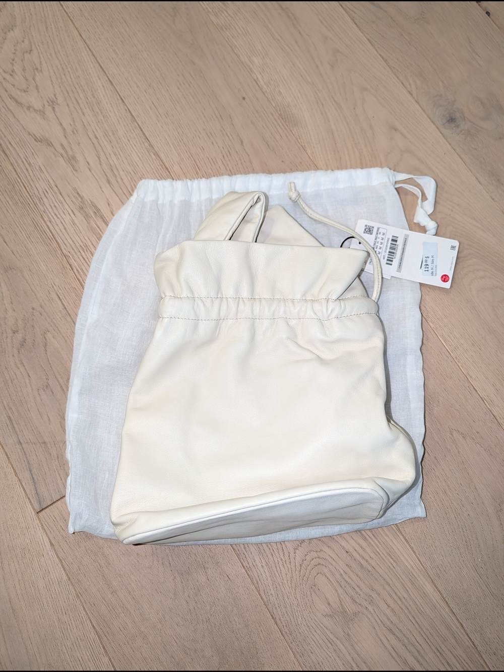 Ecru Leather Drawstring Pouch Style Bag With Shoulder Strap